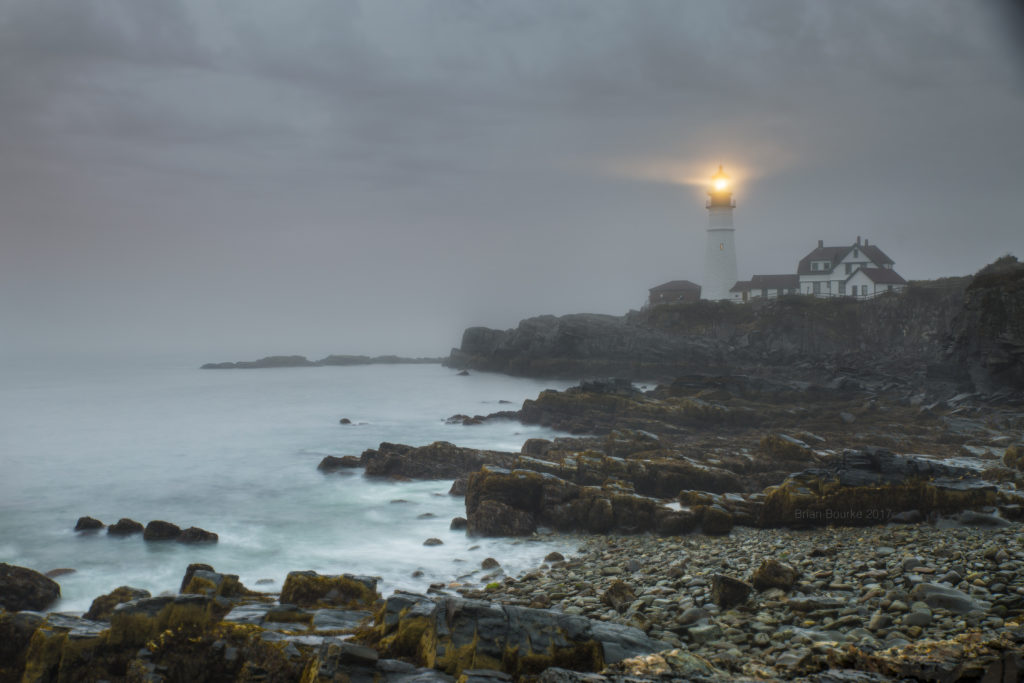 How do lighthouses keep ships safe?